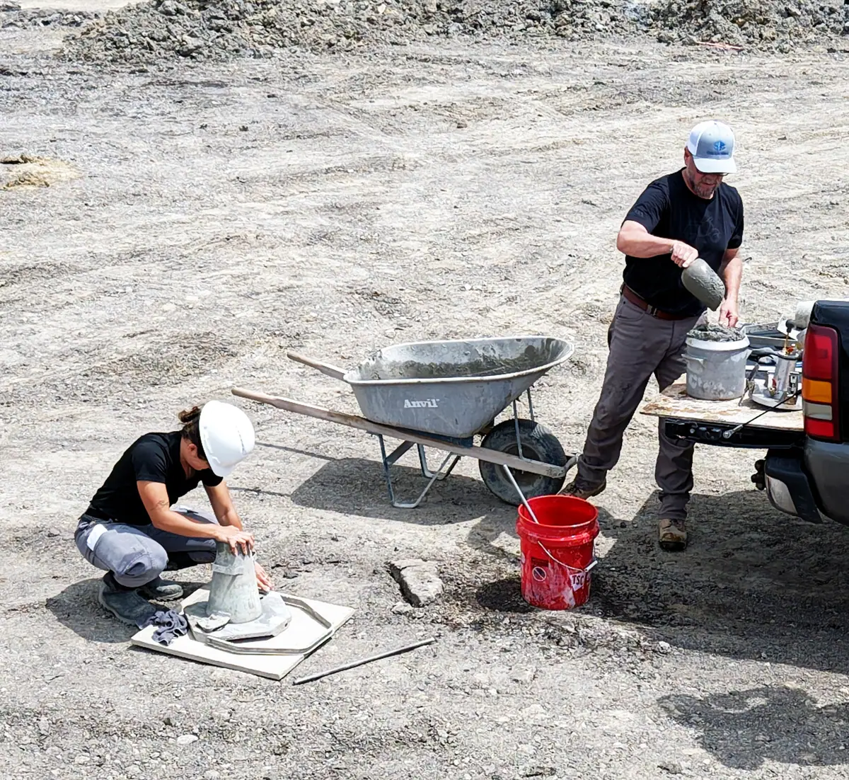 Civil Solutions technicians performing fresh concrete field tests